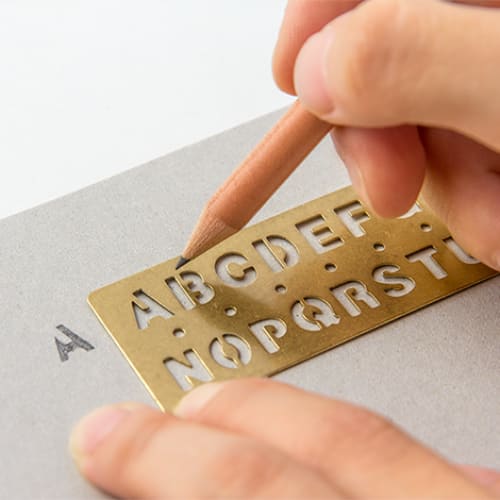 BRASS Template Bookmark Alphabet - The Outsiders