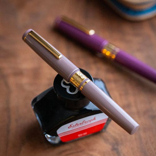 Model J Violet Ebonite with Gold trim - Medium - Fountain